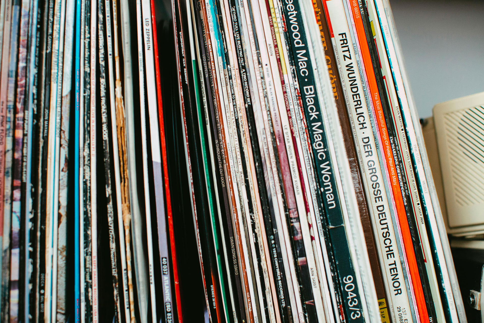 Overpacked Warped Vinyl Records On Shelf Storage