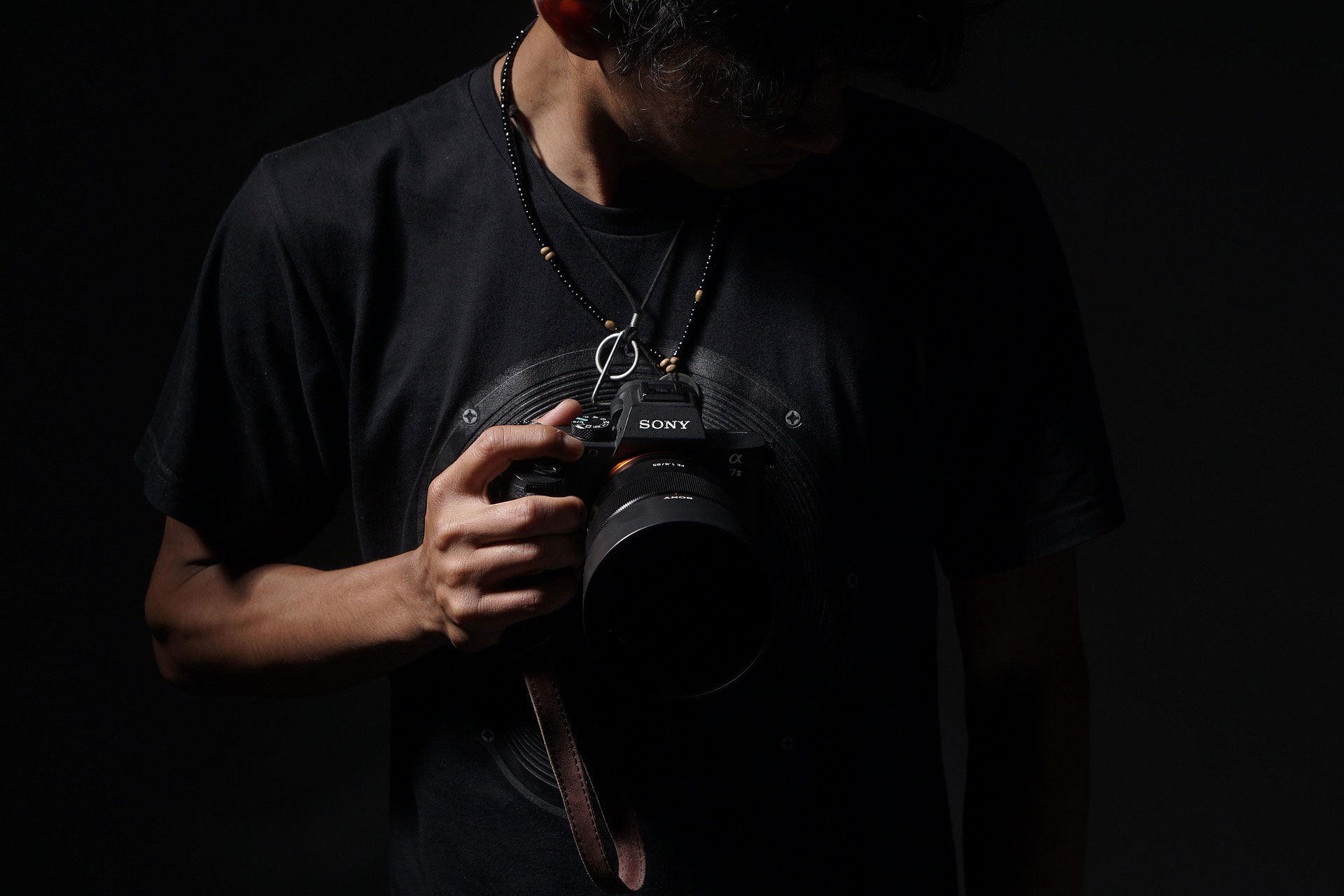 Photographer holding camera using AI tools for visual storytelling
