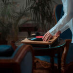 Vinyl Myths Busted - A person playing vinyl record on turntable